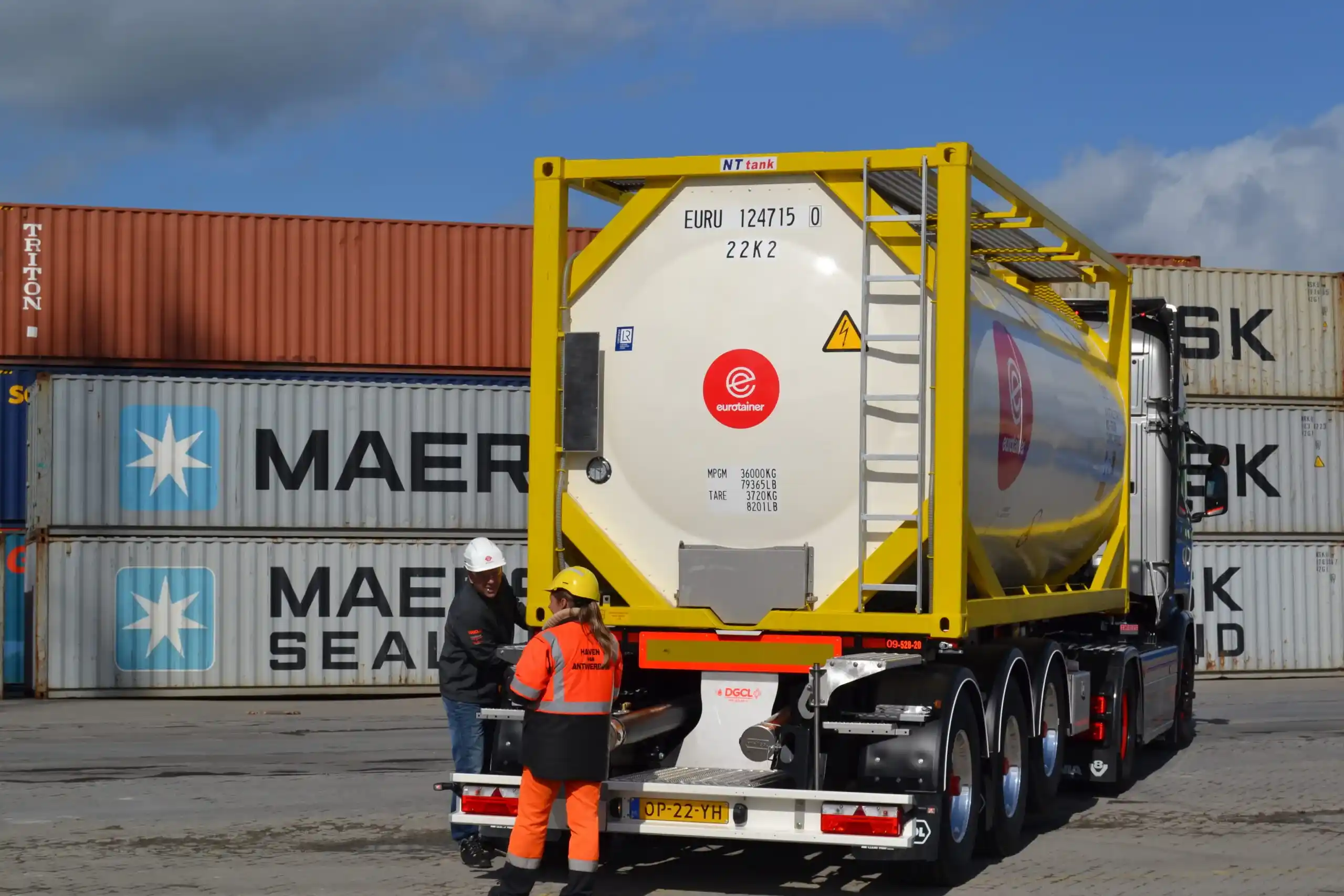 Tank container liquid T11 on truck with technician on sea port - eurotainer